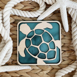 Sea Turtle Coaster Decor displayed in a wicker basket with rope and starfish.